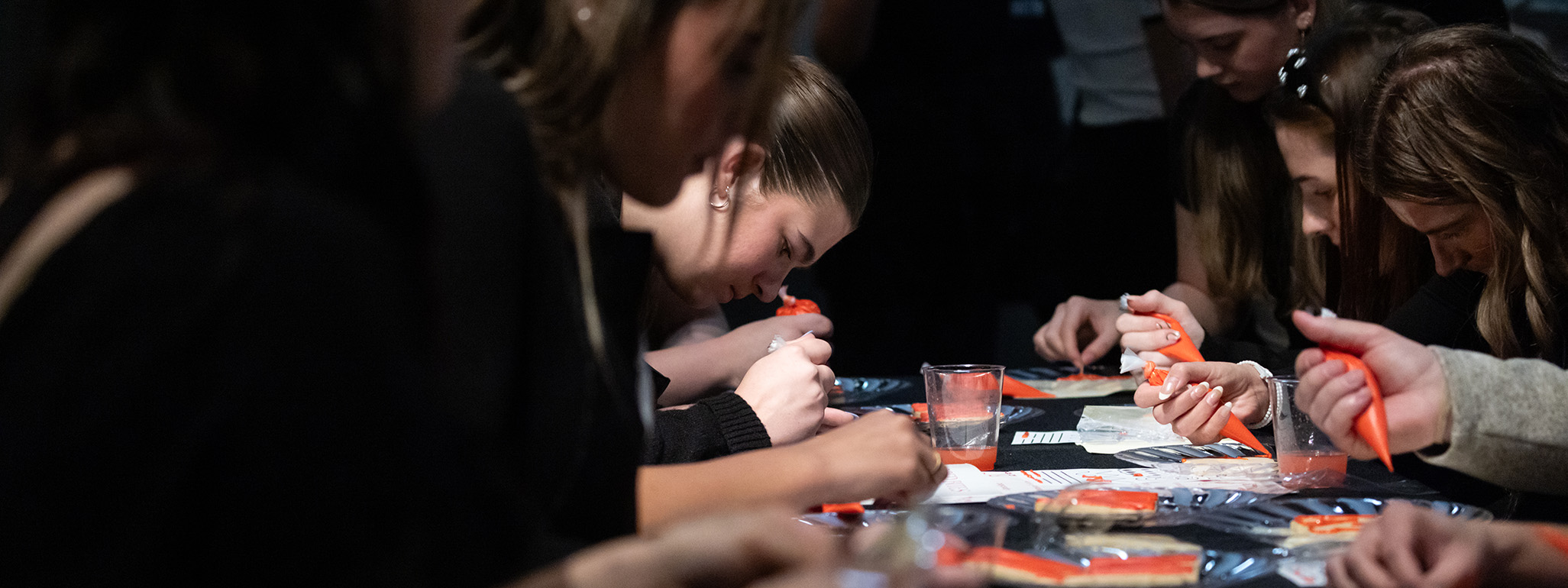 HRTM students working on event task.